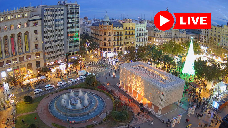 Webcam Valencia – Plaza del Ayuntamiento con vistas a la espectacular Plaza del Ayuntamiento, su fuente, edificios de Correos y Ateneo Mercantil, y la entrada a la Calle de las Barcas